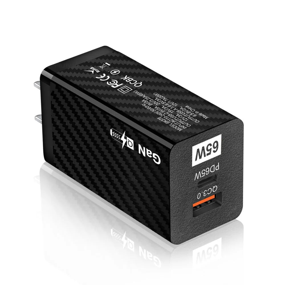Gallium nitride 65W USB-PD laptop charger in black or white with compact dimensions and regional plug options