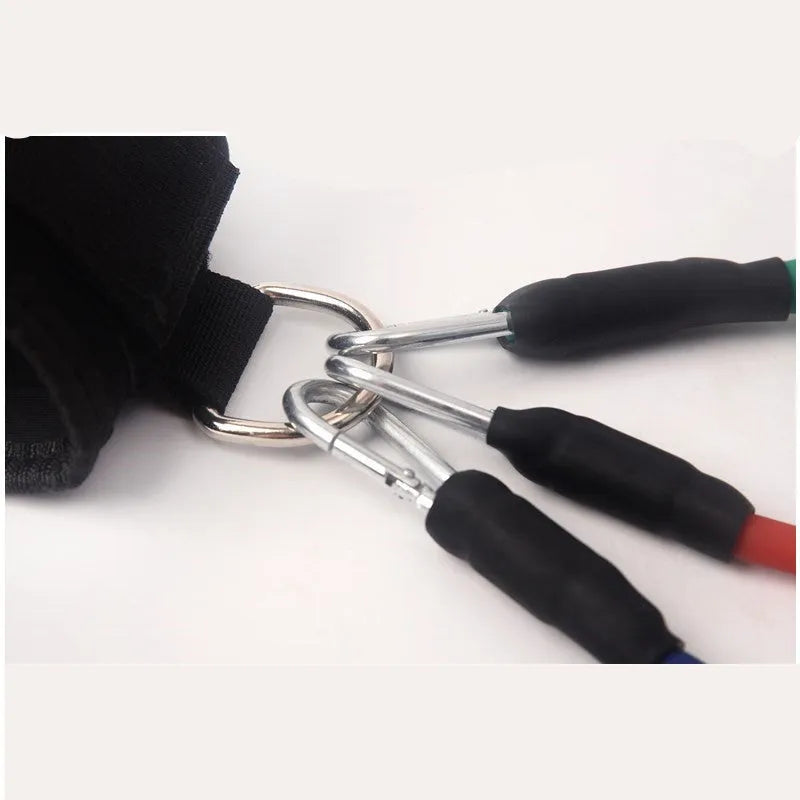 Black explosive force leg training pull rope set for taekwondo on a plain background.