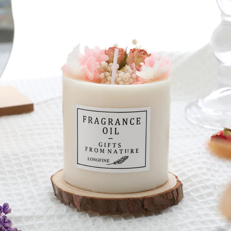 Glass jar scented candle with dried flower decoration, available in multiple fragrance options