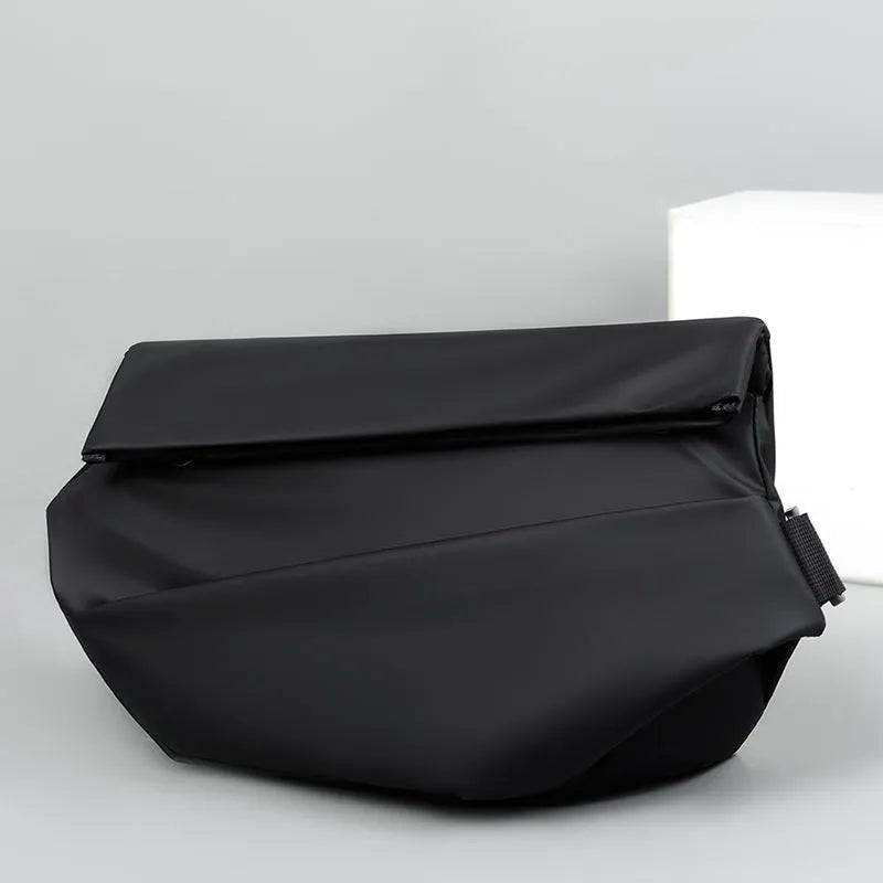 Grey PU crossbody bag with single adjustable shoulder strap showing interior phone pocket