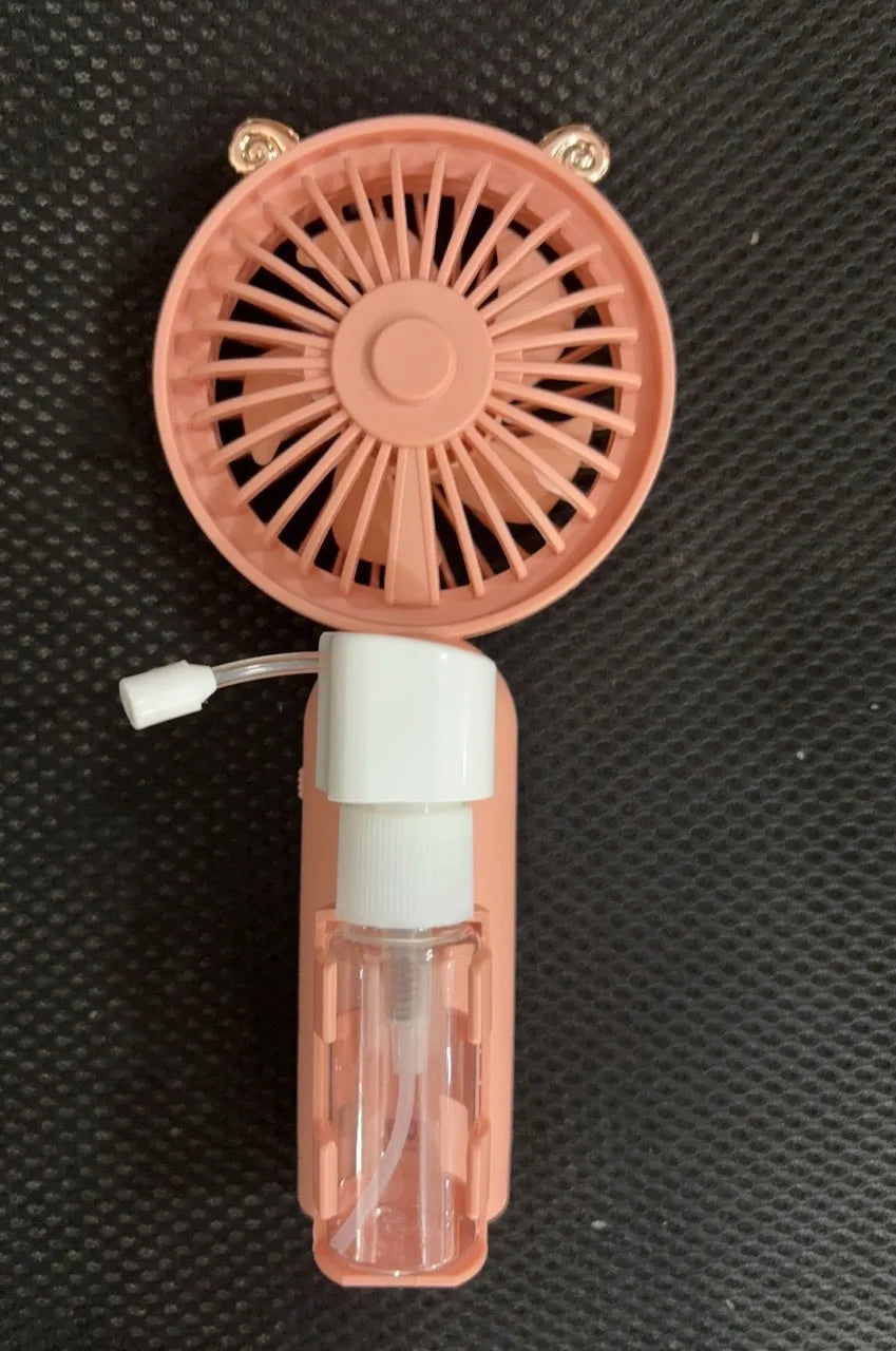 Personalised plastic USB desktop fan in choice of colours on a desk