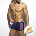 Men's polka dot print quick-drying swimming boxers in nylon fabric on a size chart.