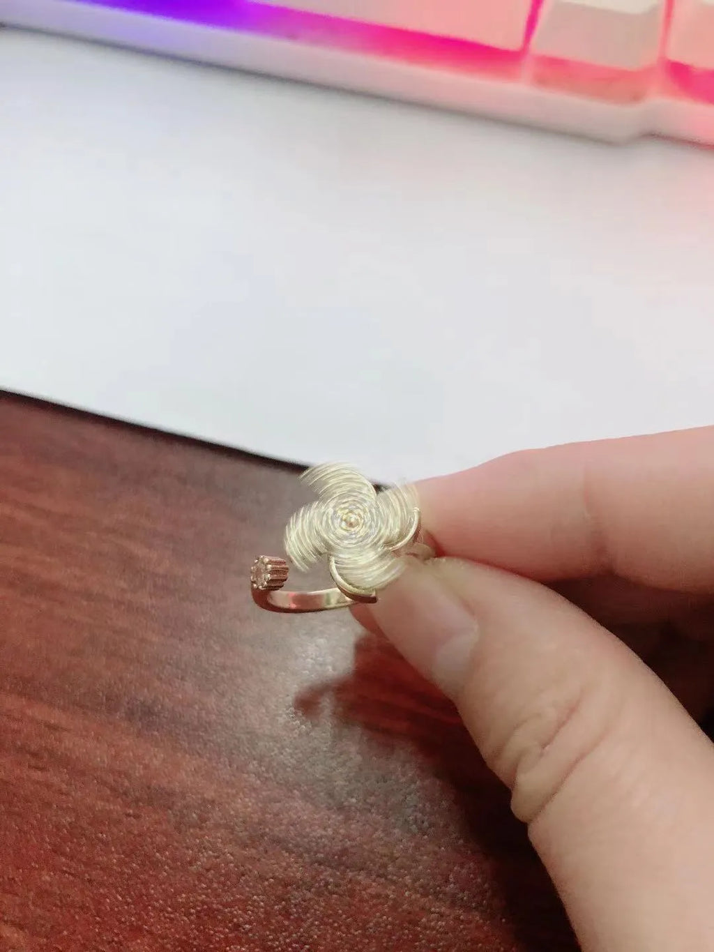Copper ring with rotating windmill centrepiece in gold or silver finish
