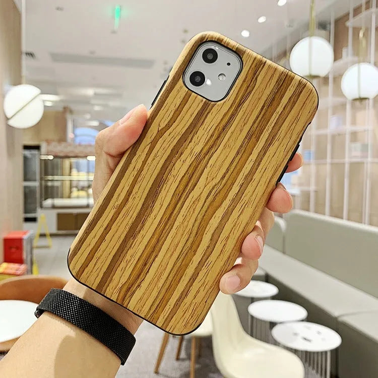 Slim wooden iPhone back cover in natural rosewood, teak, black rose, and walnut finishes