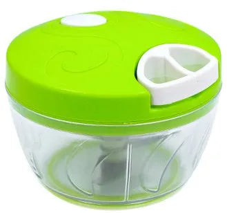 Green manual kitchen chopper with stainless steel blades and a clear lid, showing its compact size.