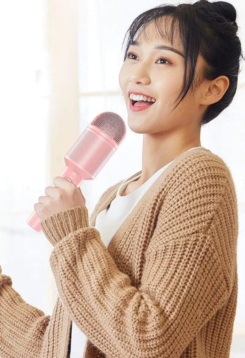 Wireless Bluetooth karaoke microphone in pink, blue, or green colours with USB connection