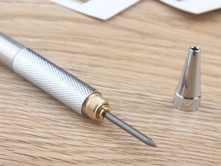 Metal automatic mechanical pencil shown with selection of compatible lead sizes including 0.5mm and 2.0mm.
