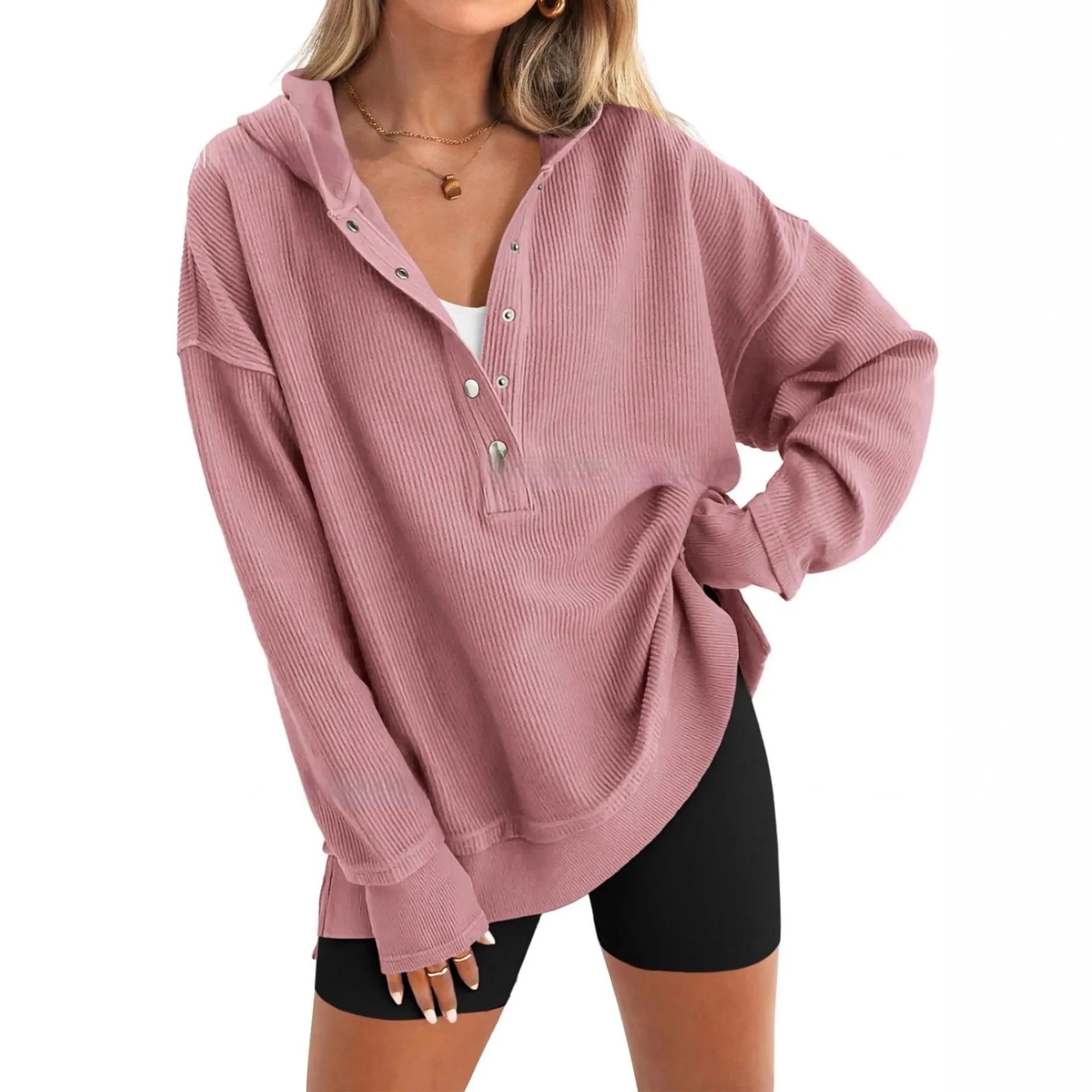 Women's loose raglan sleeve pullover sweater in peacock green colour, laid flat.