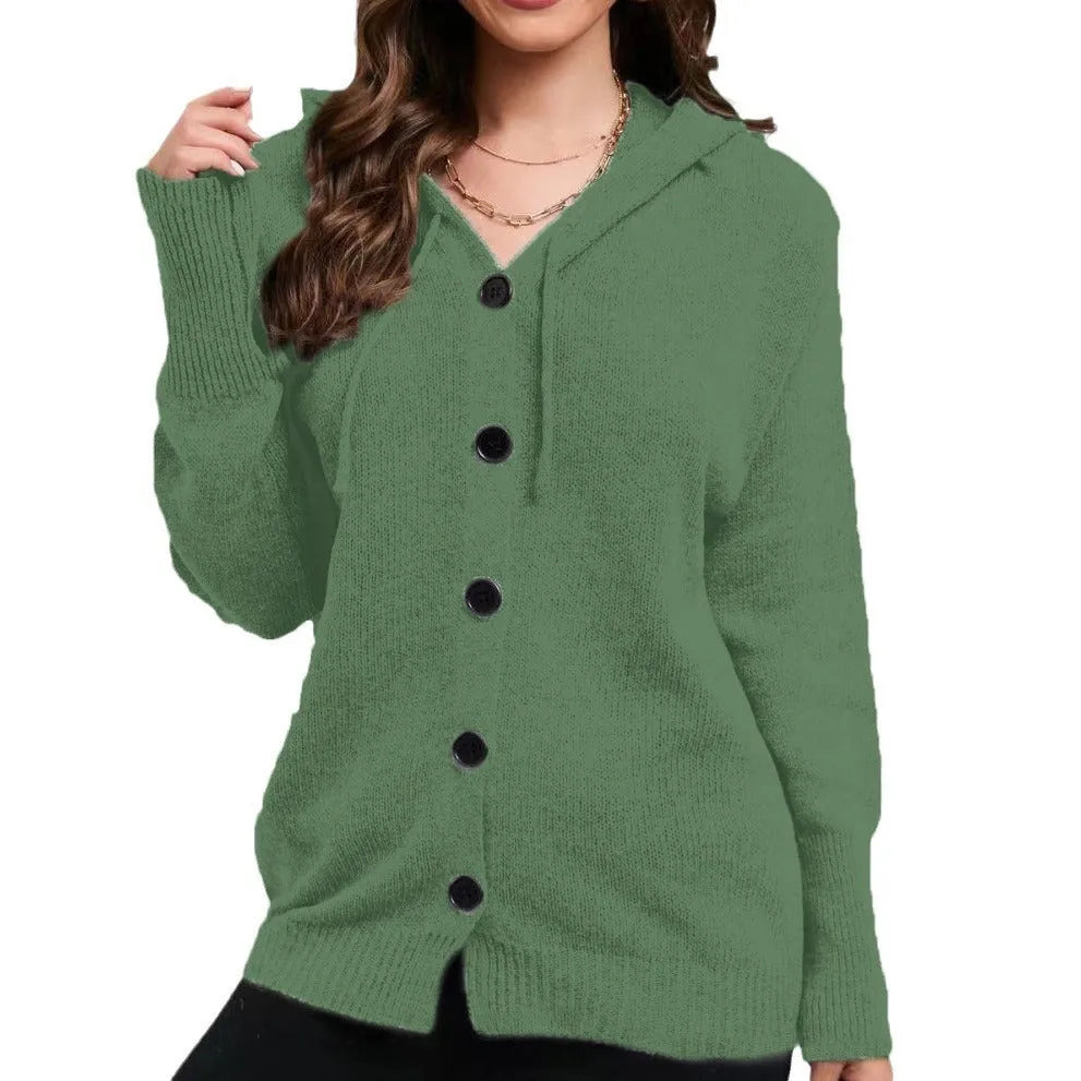 Women's solid colour loose-fit hooded cotton cardigan sweater on a hanger.