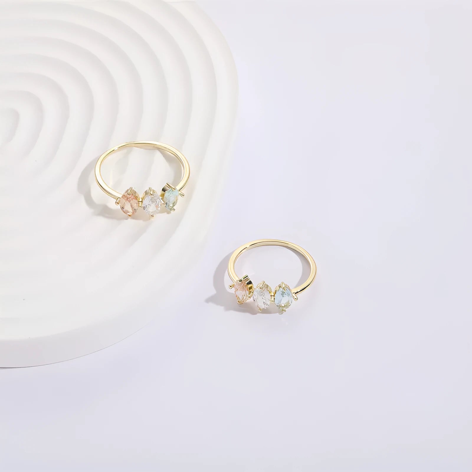 Geometric triangle birthstone ring with horse eye tricolor zircon stones in gold finish