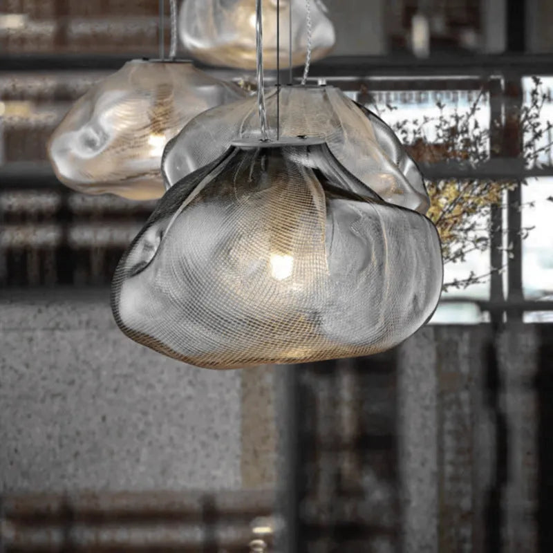Modern glass and fabric chandelier light fixture in amber, clear or smoke grey.