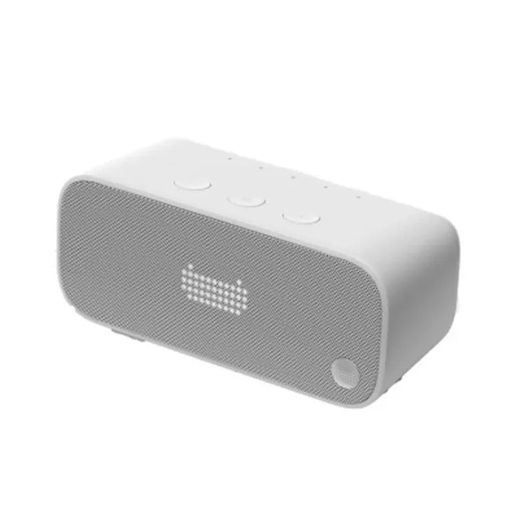 Compact Elf sugar cube AI smart WiFi speaker in blue colour on a wooden shelf