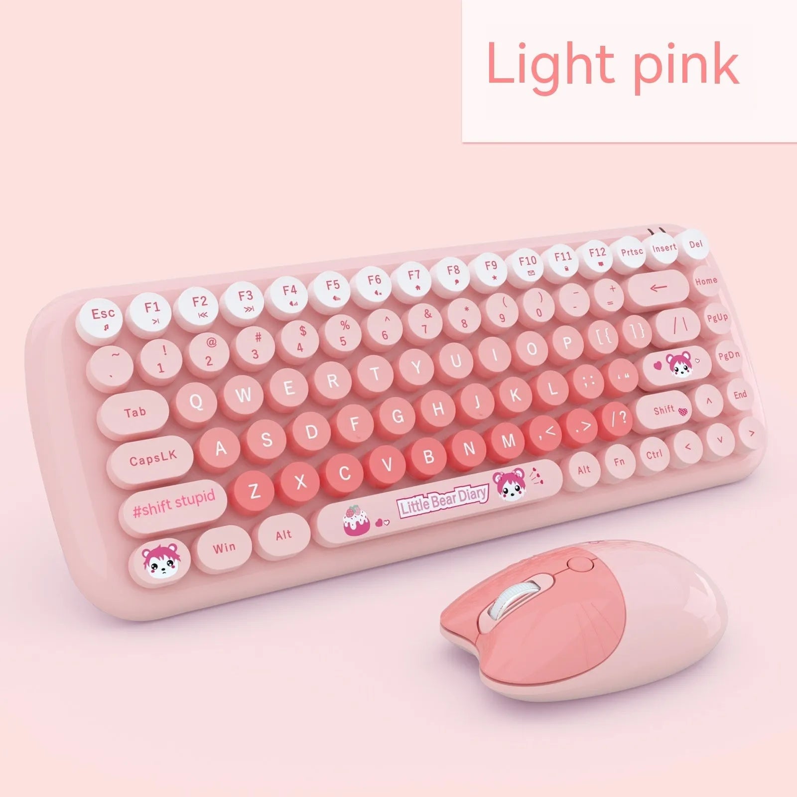 Pink miniature cartoon wireless keyboard and mouse set with USB receiver on desk