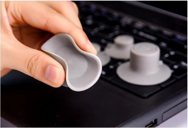 Grey durable plastic non-slip cooling pad stand feet set for laptop PC showing large and small sizes