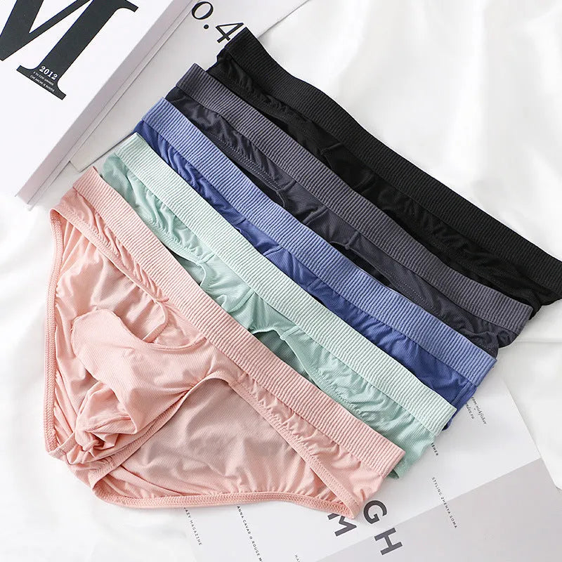 Men's Ice Silk low waist briefs in black, shown flat, highlighting the briefs cut and knitted fabric texture.