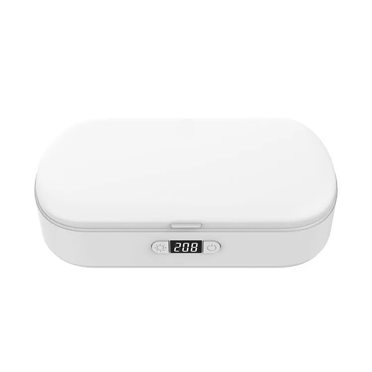 White ABS plastic wireless UV sterilizer box with disinfection chamber and wireless charging pad.
