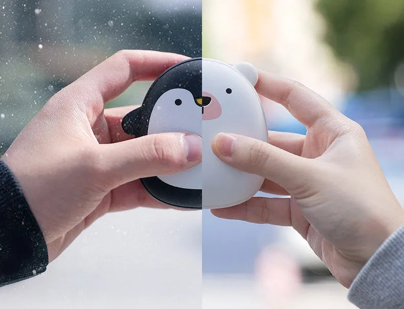 Cartoon penguin and polar bear USB rechargeable hand warmers showing front design