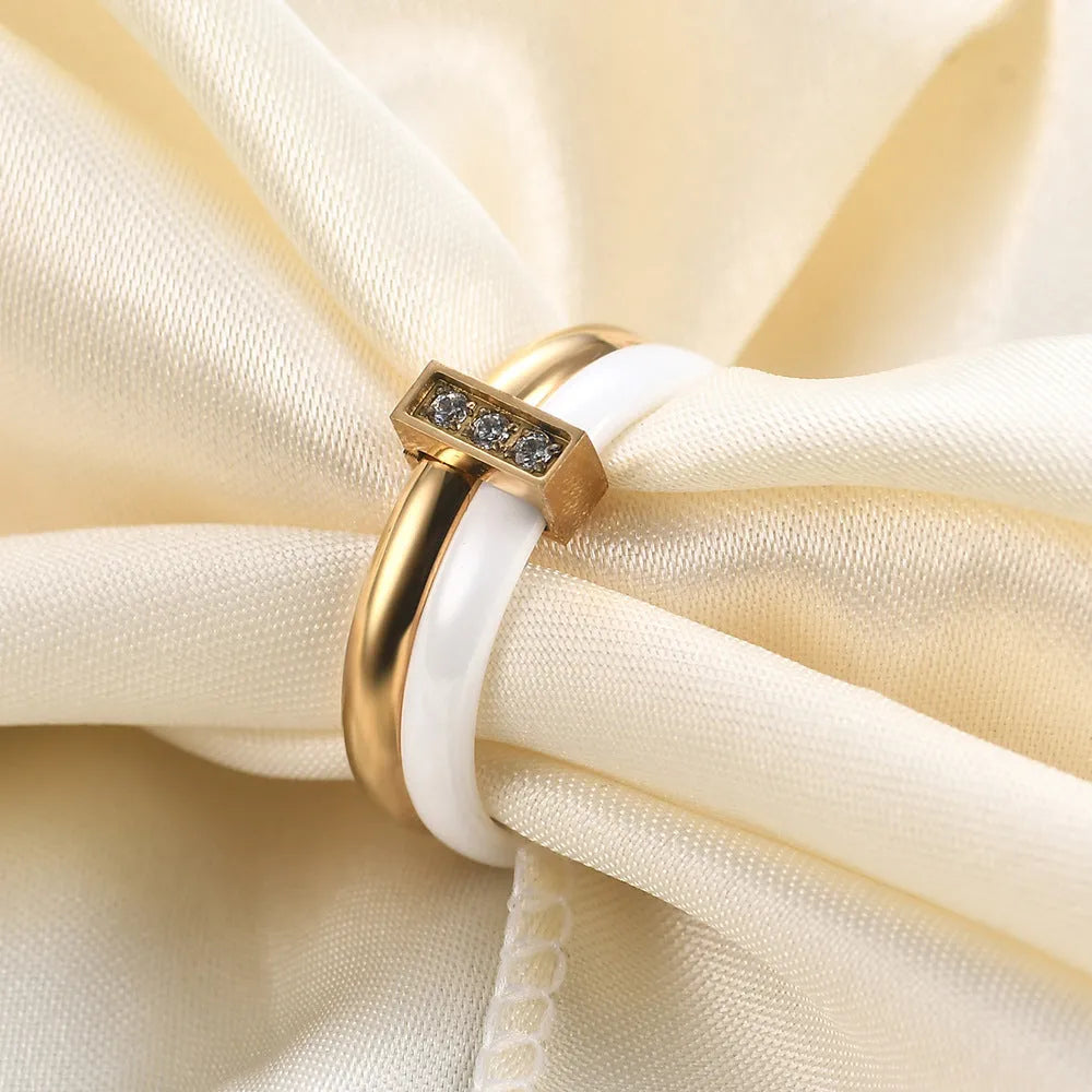 Ceramic geometric ring with glossy stitching inlaid zirconium in steel black colour