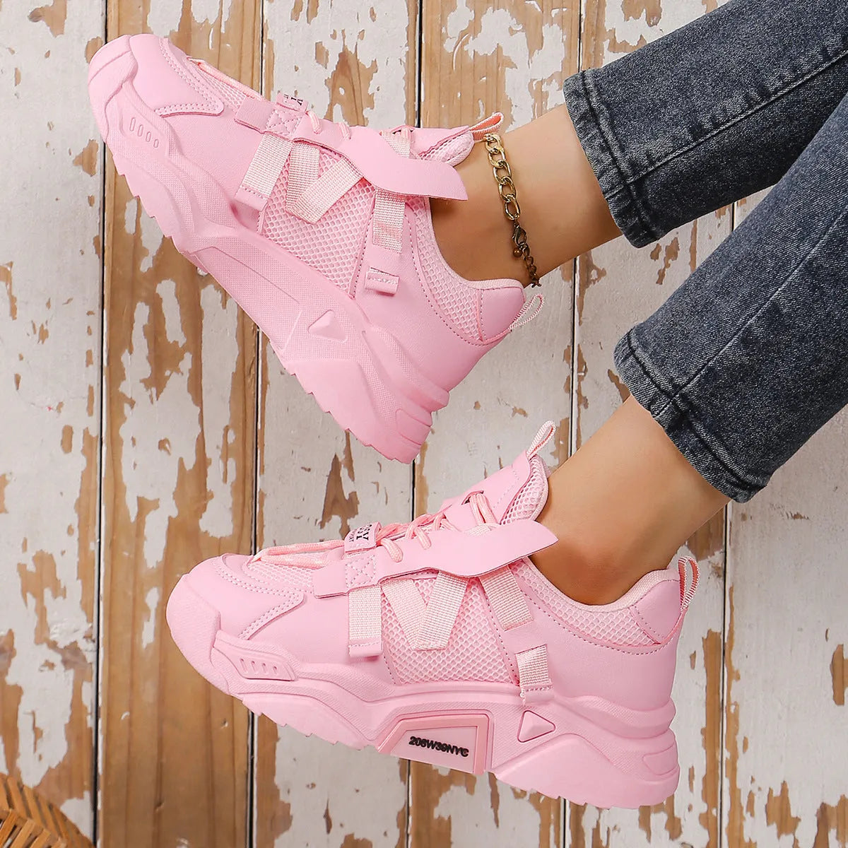 Women's purple platform mesh dad shoes with animal pattern and lace-up front.