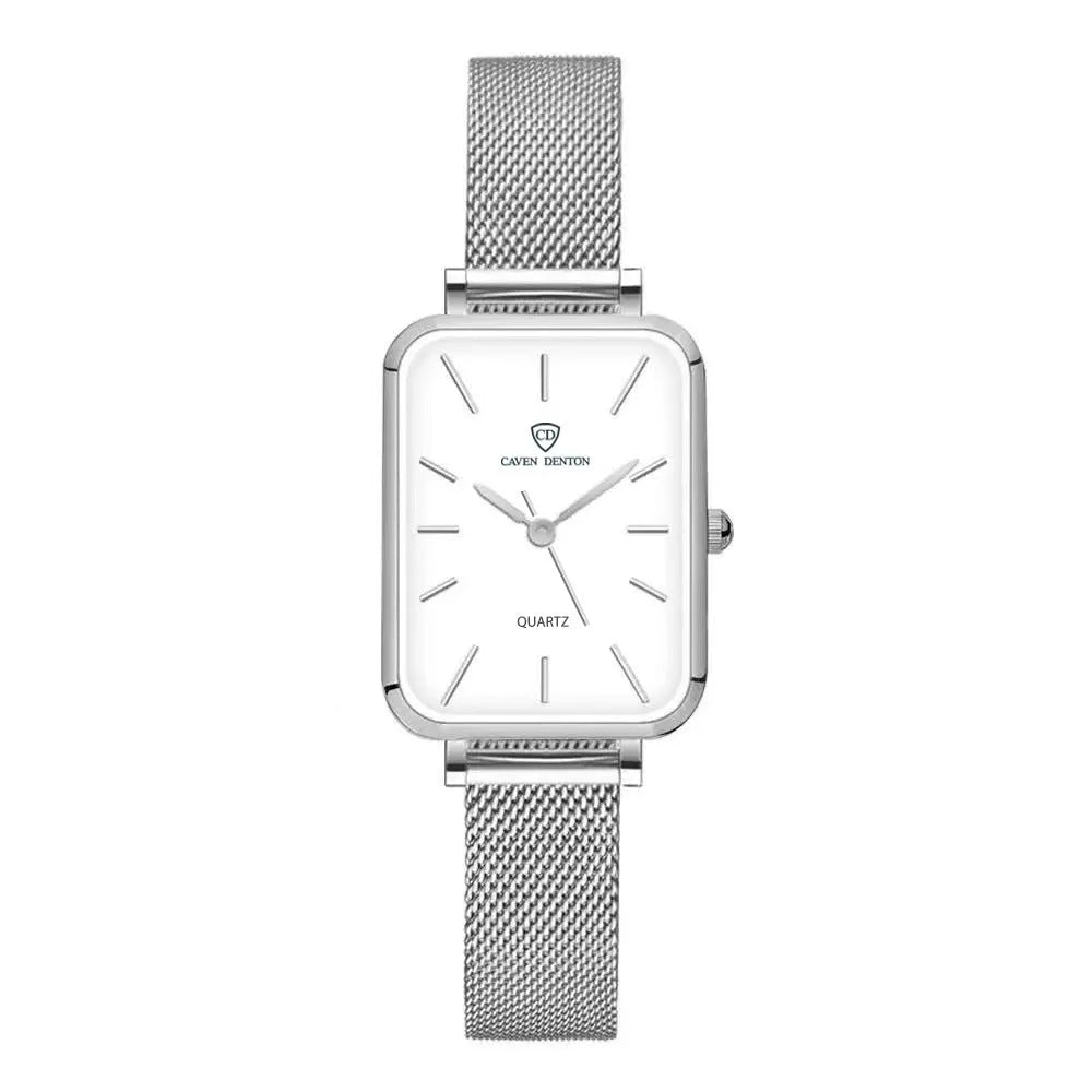 Women's rose gold waterproof quartz watch with woven steel band on wrist.