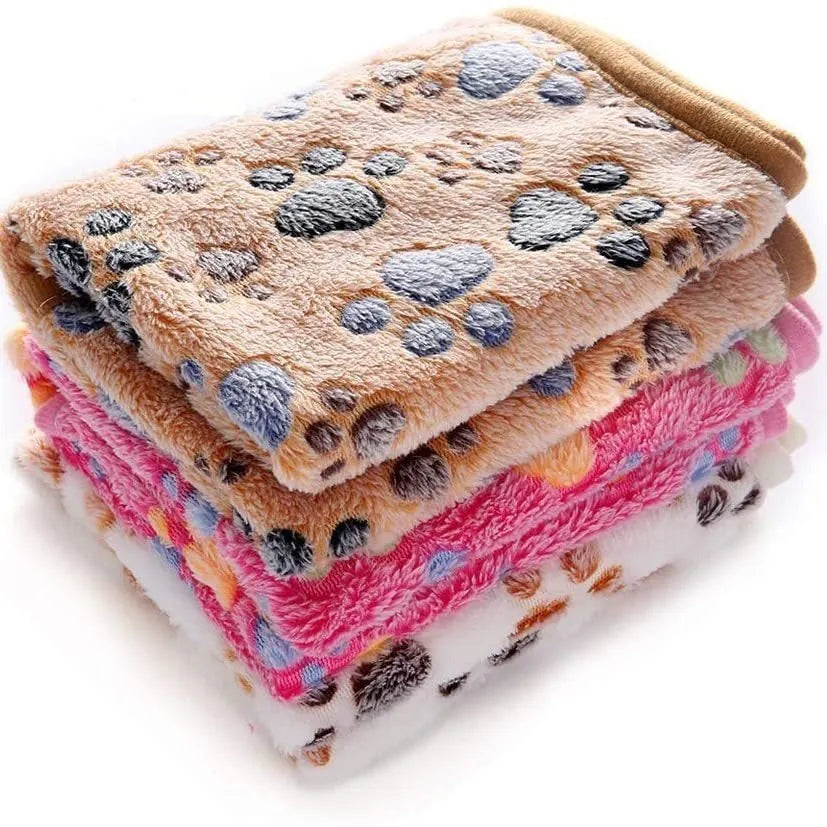 Coral fleece pet blanket with dog paw print pattern available in multiple colours and sizes for dogs and cats