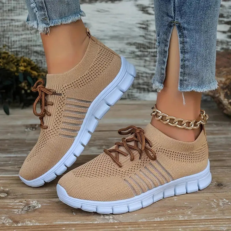 Women's breathable mesh flying knit flat shoes with round toe and low heel design