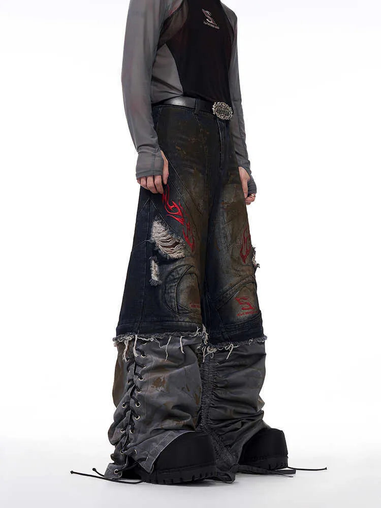 Men's retro jeans with detachable trouser legs in denim, shown in loose wide-leg fit.