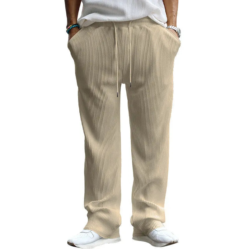 Men's straight-leg loose casual trousers in khaki colour showing high waist and relaxed fit