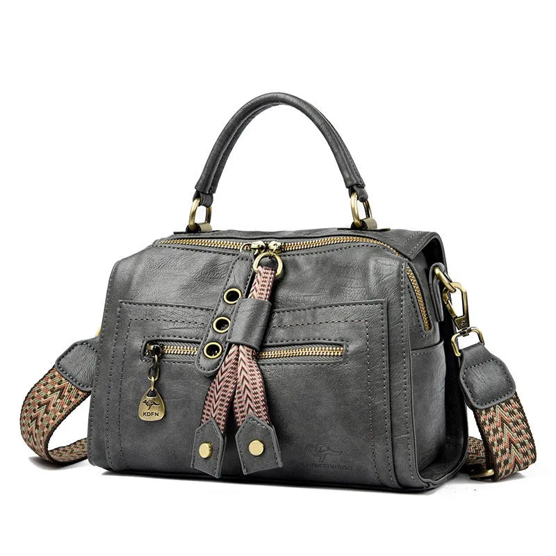 Women's grey PU leather one-shoulder crossbody bag with a square shape and outer pocket