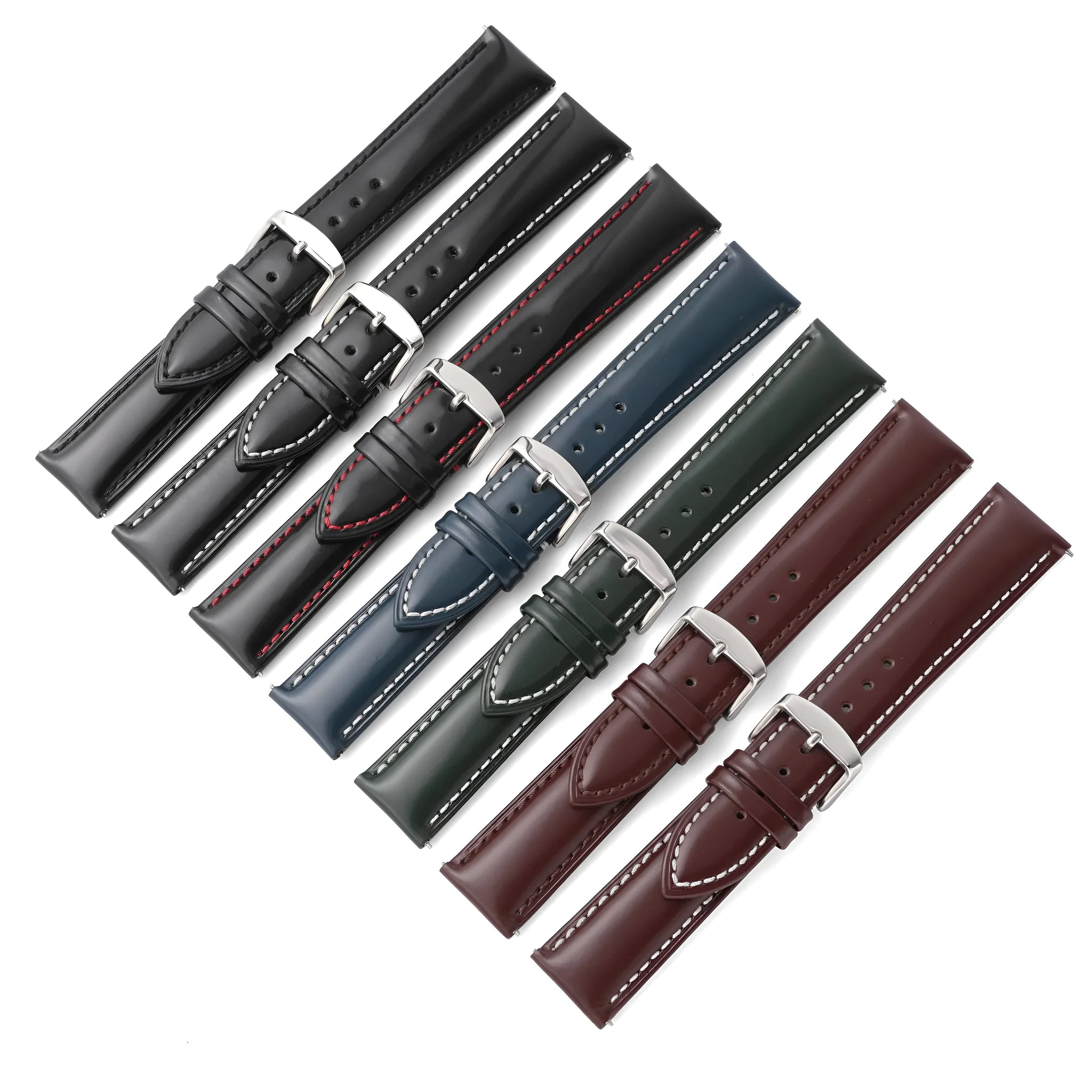 Quick release cowhide leather watch strap in black and white line colour on a watch.
