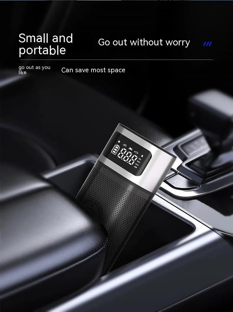 Black portable wireless air pump with 15cm tube, USB charging cable, and multiple nozzles for different inflation needs
