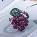 Gold-plated black gold ring with simulation red corundum stone and geometric flower design