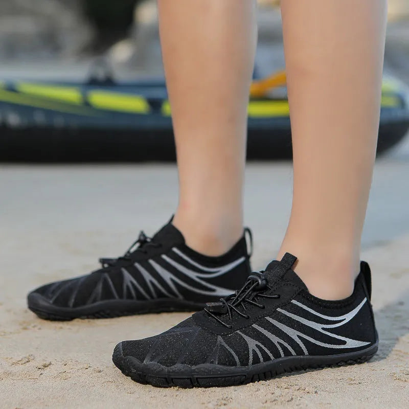 Men's and women's breathable casual sports running shoes with lace-up front and rubber sole.