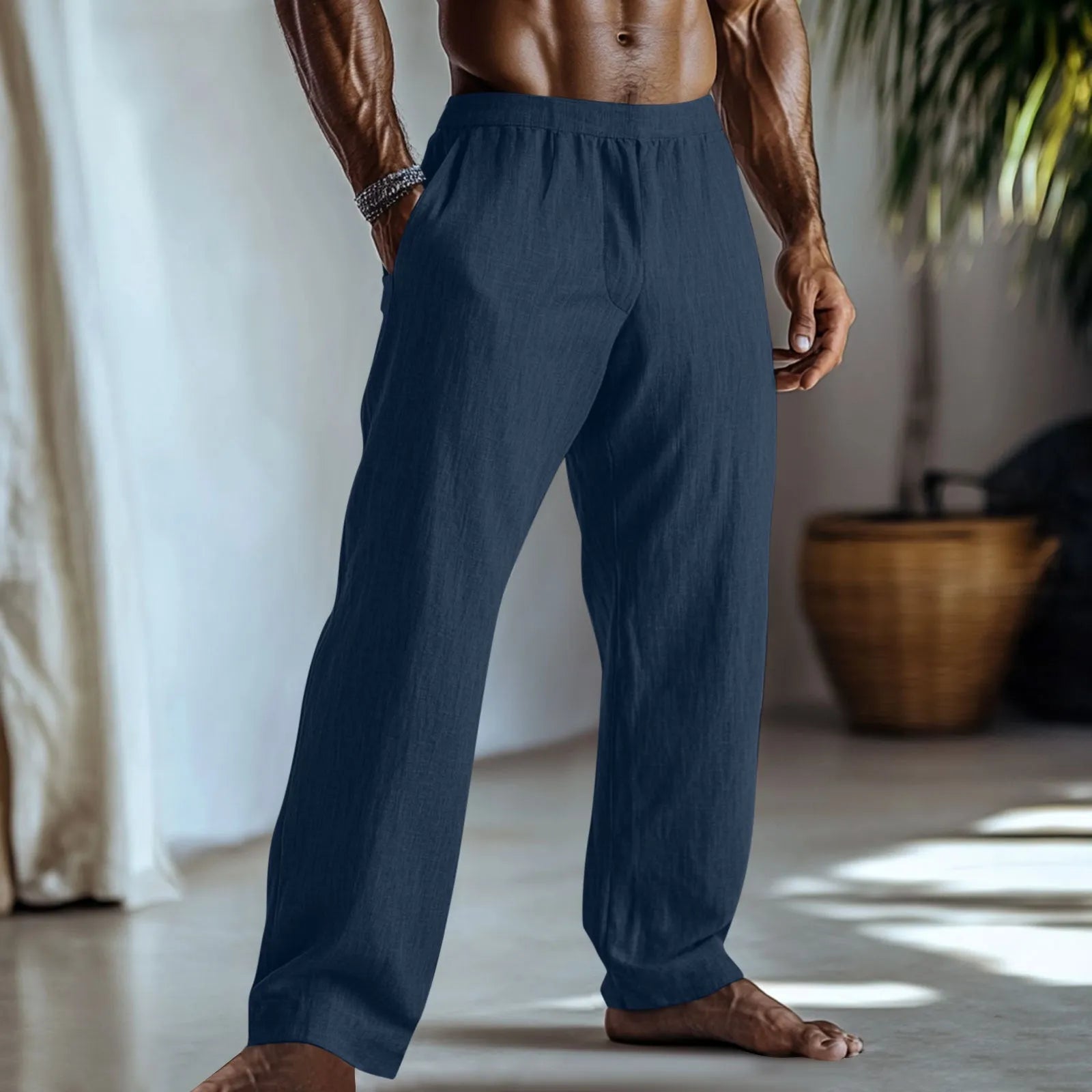 Cotton and linen straight-leg casual trousers in a solid colour with pockets, showing British style fit.