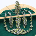 Retro botanical pattern jewellery set in copper alloy with zircon stones, showing necklace, bracelet, earrings, and ring.