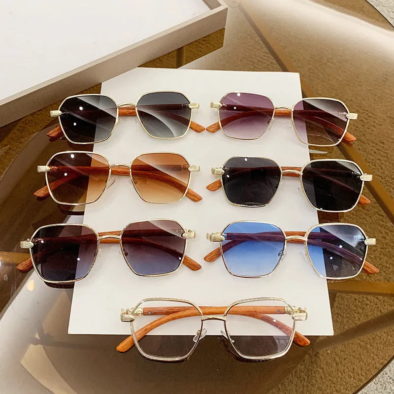 Frameless trim women's alloy frame glasses with wood grain effect in gold and blue colour option.
