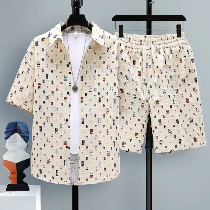 Men's grey casual polyester short-sleeve top and shorts two-piece set laid flat.