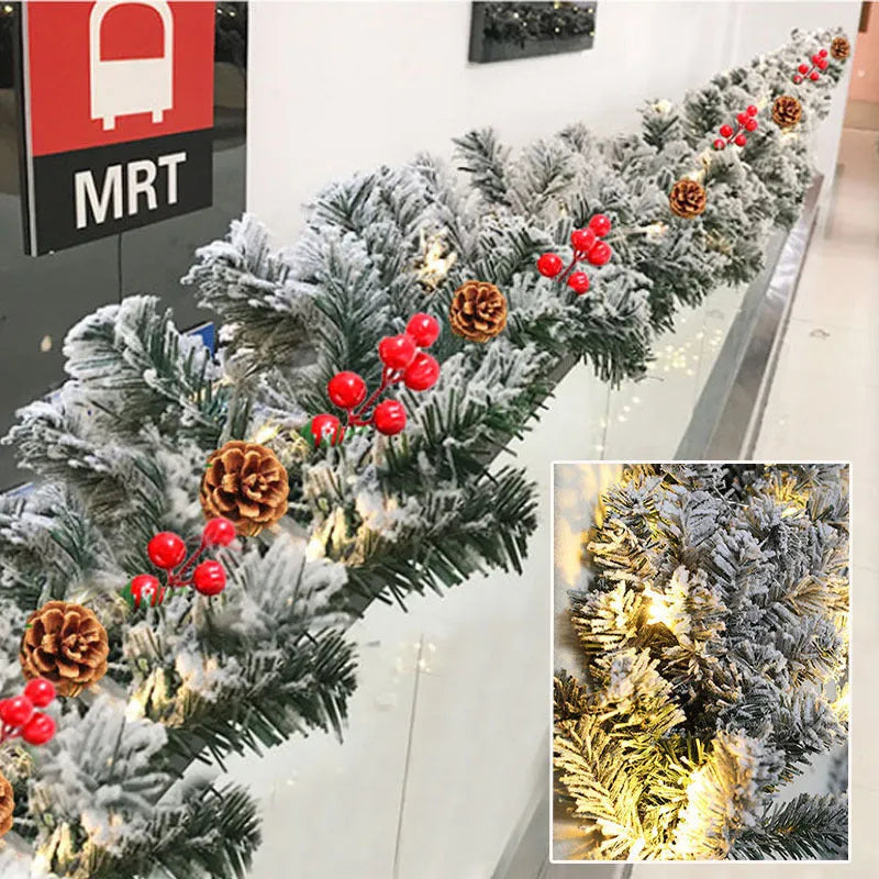 Artificial rattan Christmas garland with white flocking snow decoration draped across a mantelpiece