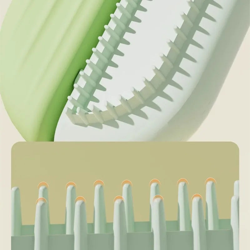 Blue pet grooming comb with water tank for dogs and cats on a white surface.