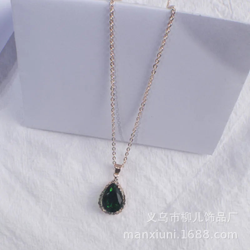 Rose gold plated drop pendant necklace with colourful rhinestones in a pink colour option.
