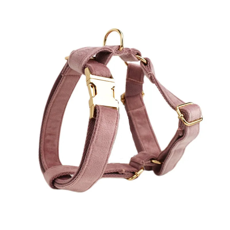 Light purple pink velvet dog collar set with leash, vest, bow, and poop bag accessories