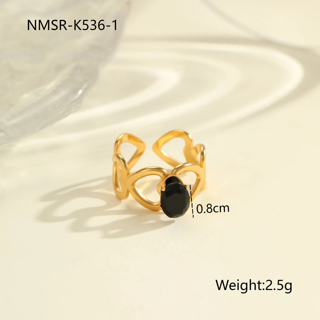 Geometric stainless steel ring for women with zircon detail and open adjustable design.
