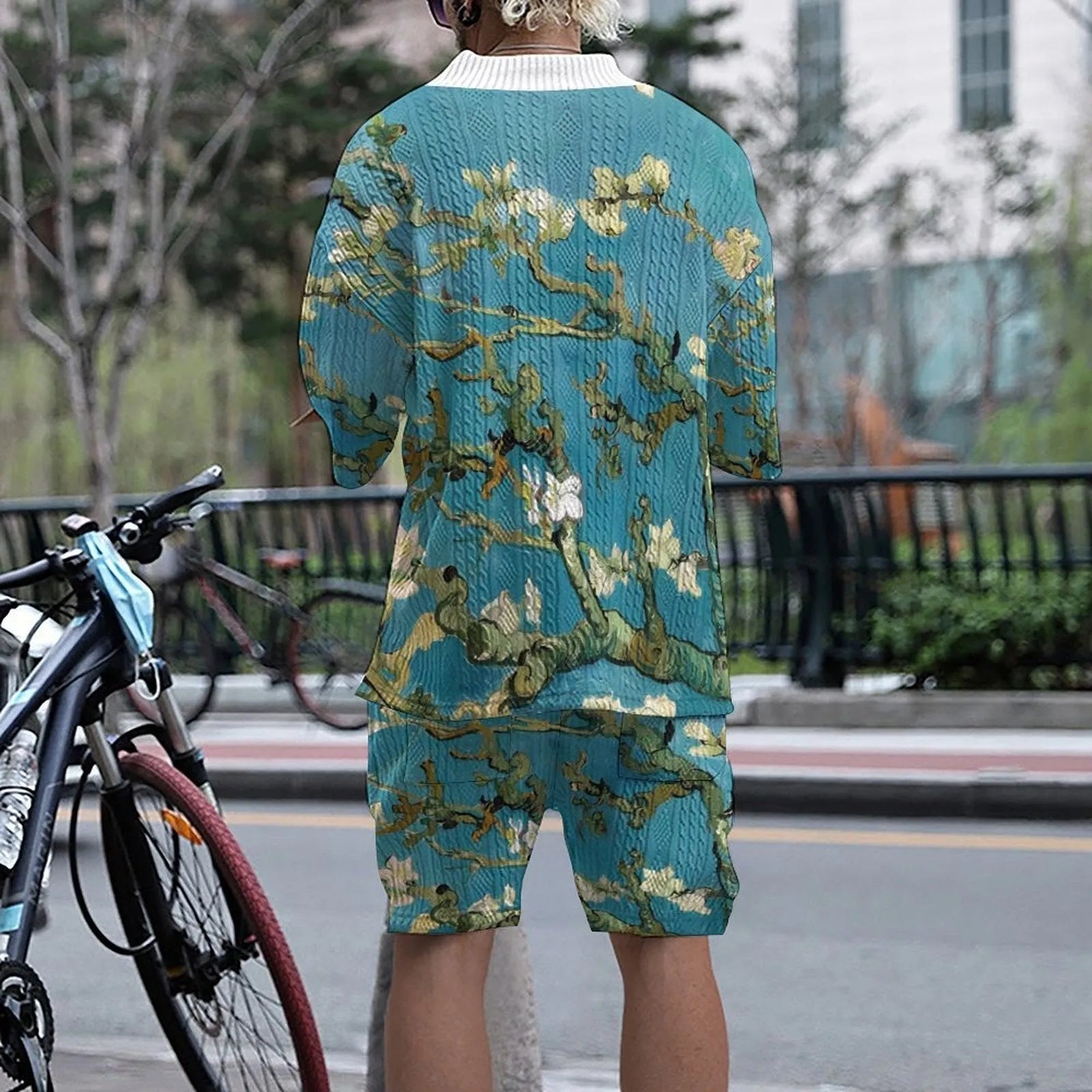 Men's peacock blue knitted shorts suit with 3D printed pattern, T-shirt jacket, and mid-length trousers