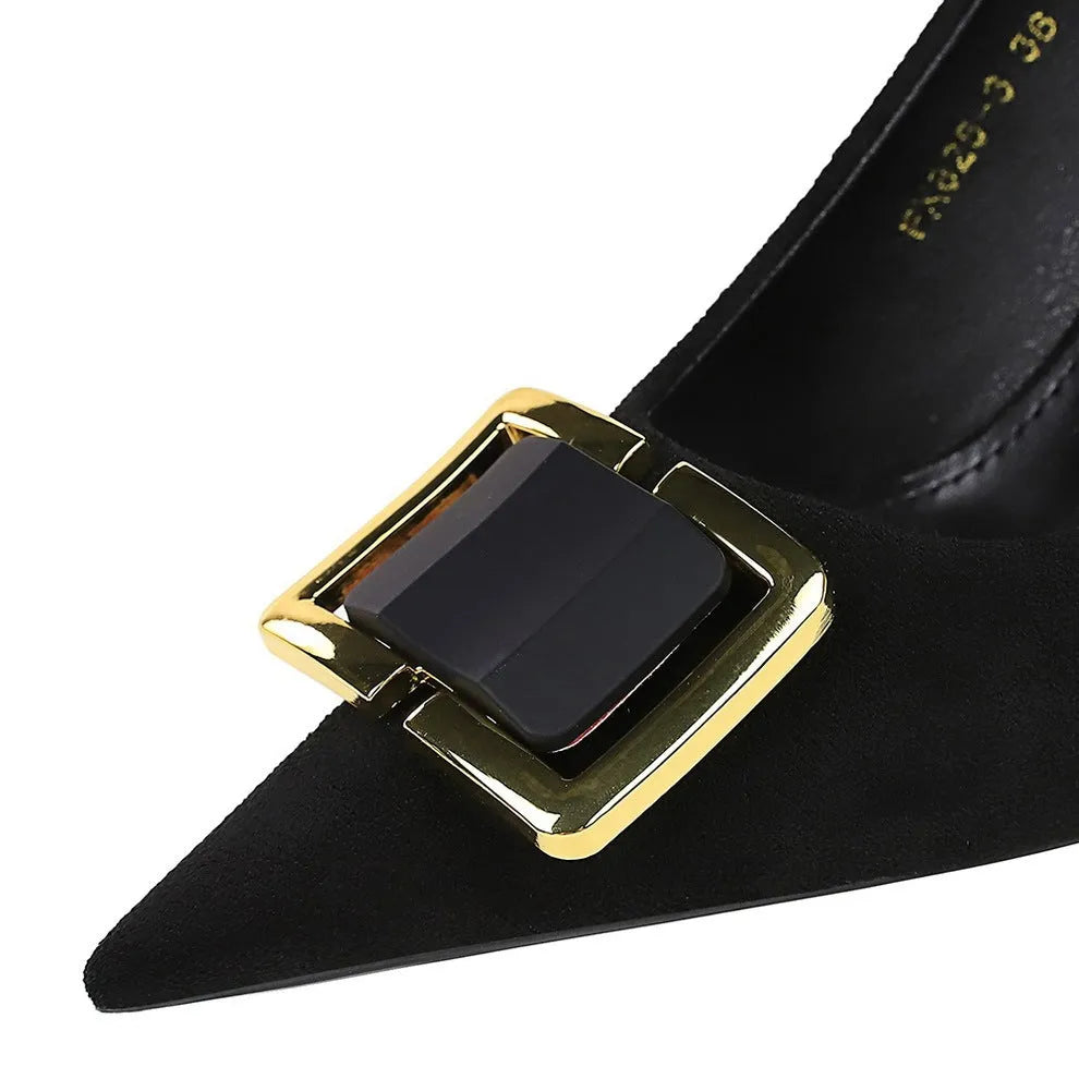 Black suede women's stiletto high heels with a pointed toe and thin 9cm heel.
