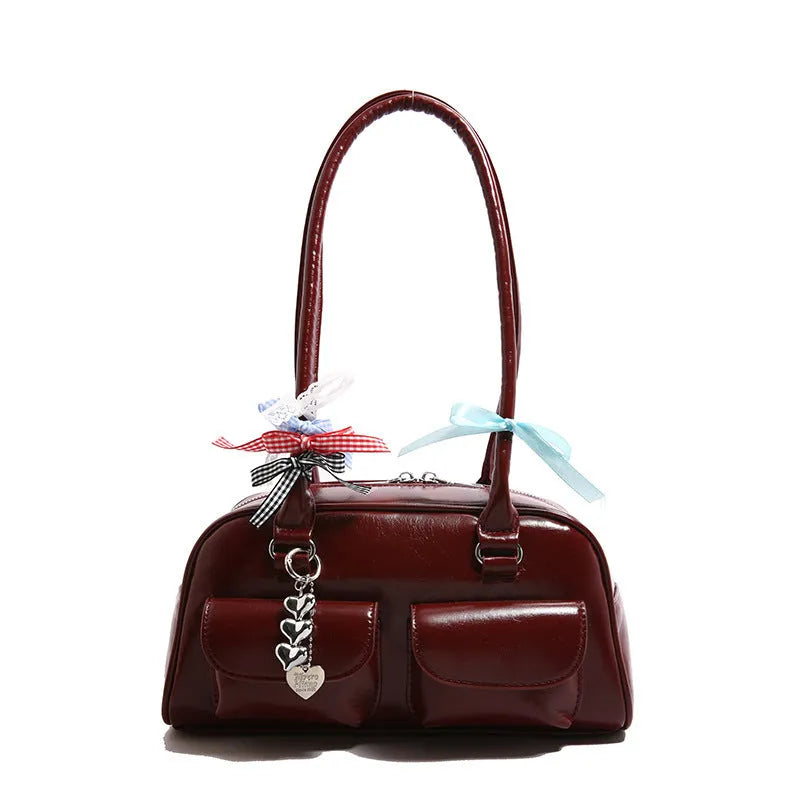Retro women's pillow bag in PU leather with double shoulder straps and flap closure