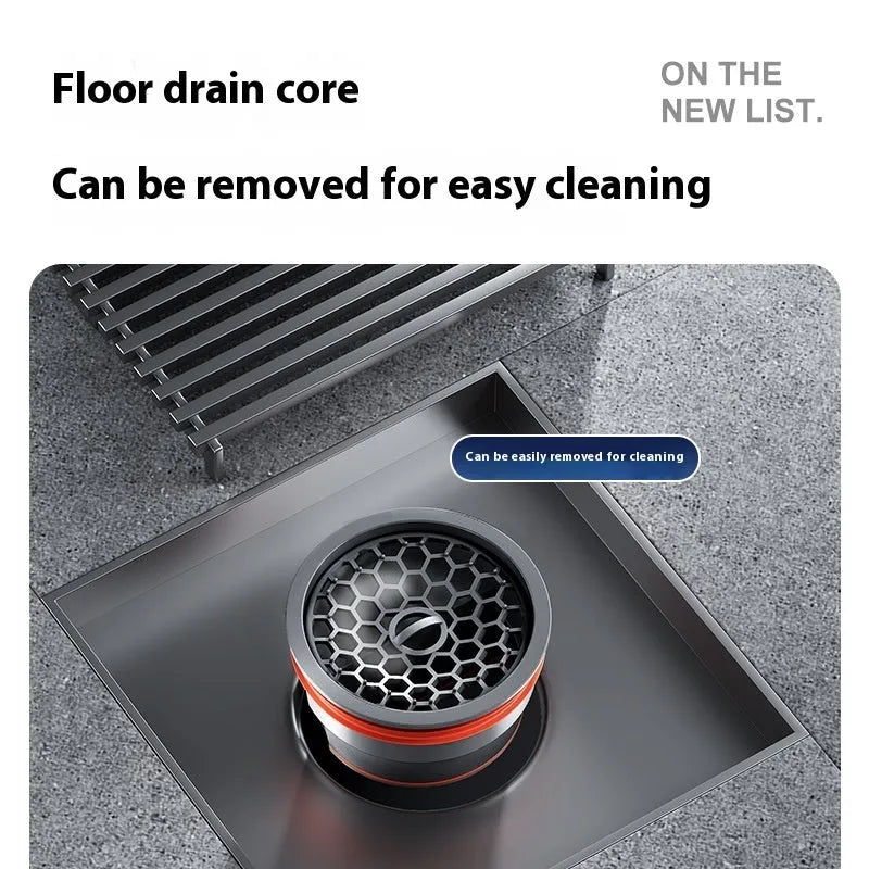 Gun grey 304 stainless steel courtyard floor drain with a 15x15cm ABS plastic core insert.