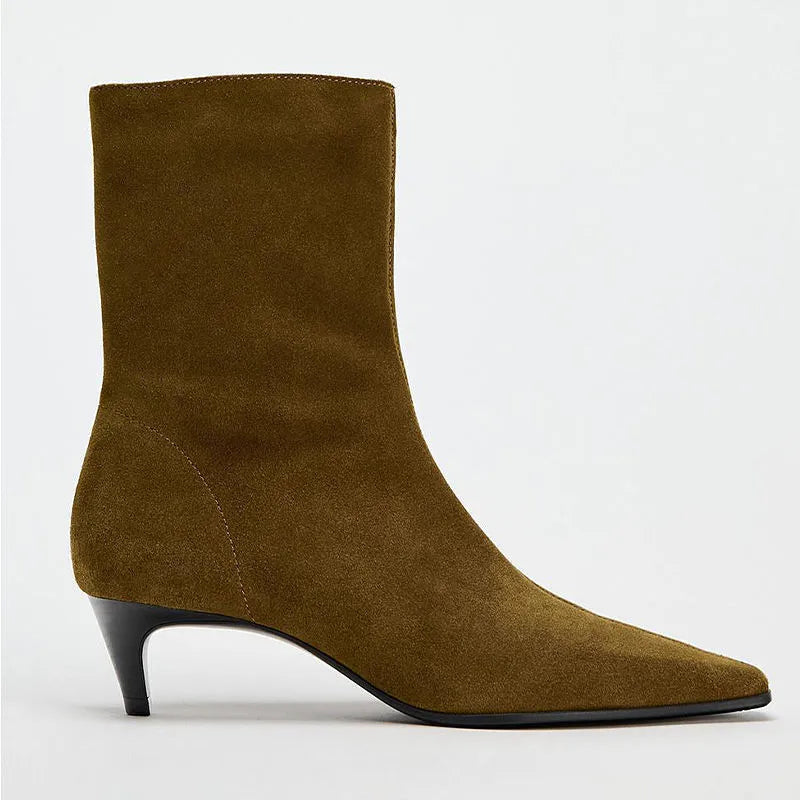 Brown square toe women's ankle boots with a side zip and a mid kitten heel on a waterproof platform sole.