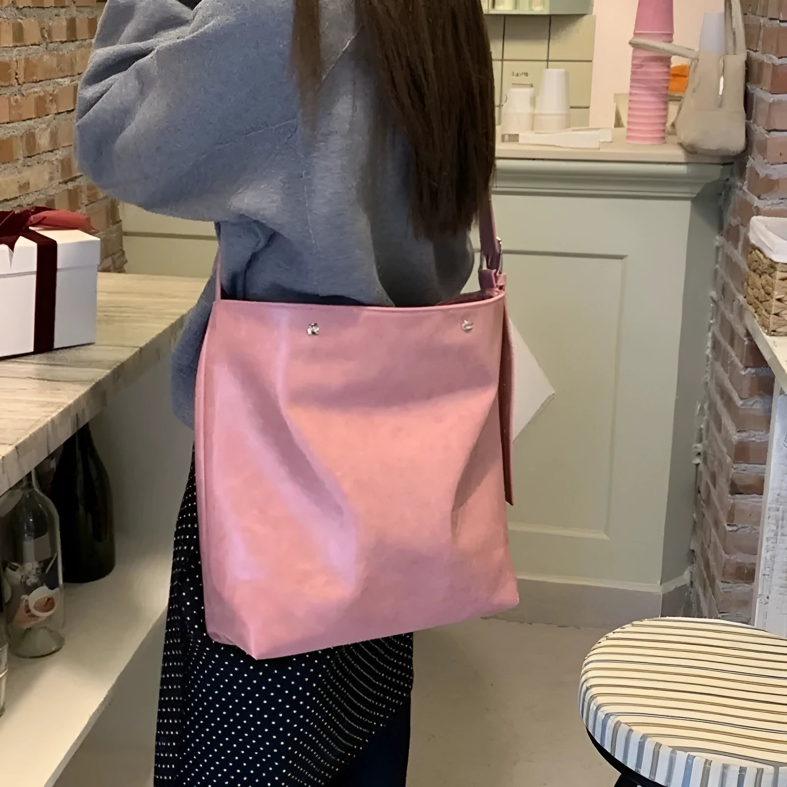 Corduroy one-shoulder commuter bag in pink or brown with PU lining, showing dimensions
