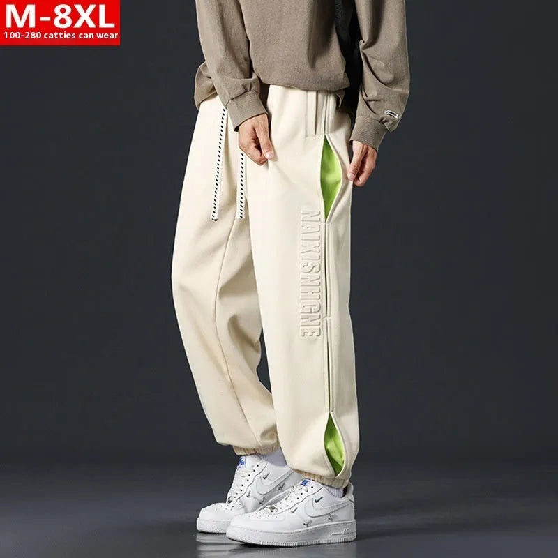 Men's loose fit trousers with stitching printing detail and banded ankle cuffs in micro elastic cotton fabric