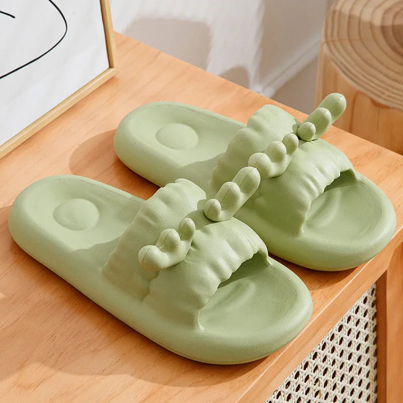 White women's flip flop slippers with deer horn design and hollow-out EVA upper on a light background.